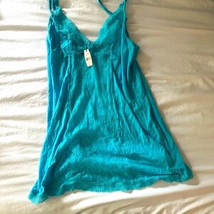 Cami in aqua blue. Never worn, missing the bottoms